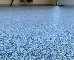 Epoxy floor with blue epoxy flakes