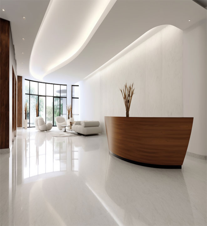 A living room with chairs, table, and a floor coated with white epoxy paint.